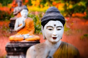 Tilt shift blur effect. Amazing view of lot Buddhas statues in Loumani Buddha Garden. Hpa-An, Myanmar (Burma) travel landscapes and destinations