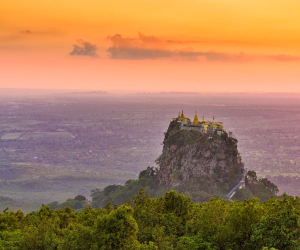 Taung Kalat Monastery on Mt. Popa, Myanmar at dusk.